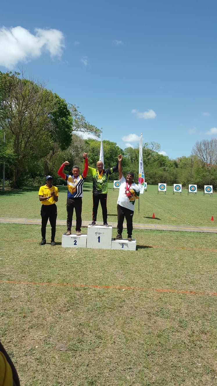 Robert Singh of Archery Guyana and other medalists at the Barbados Senior Games 2023