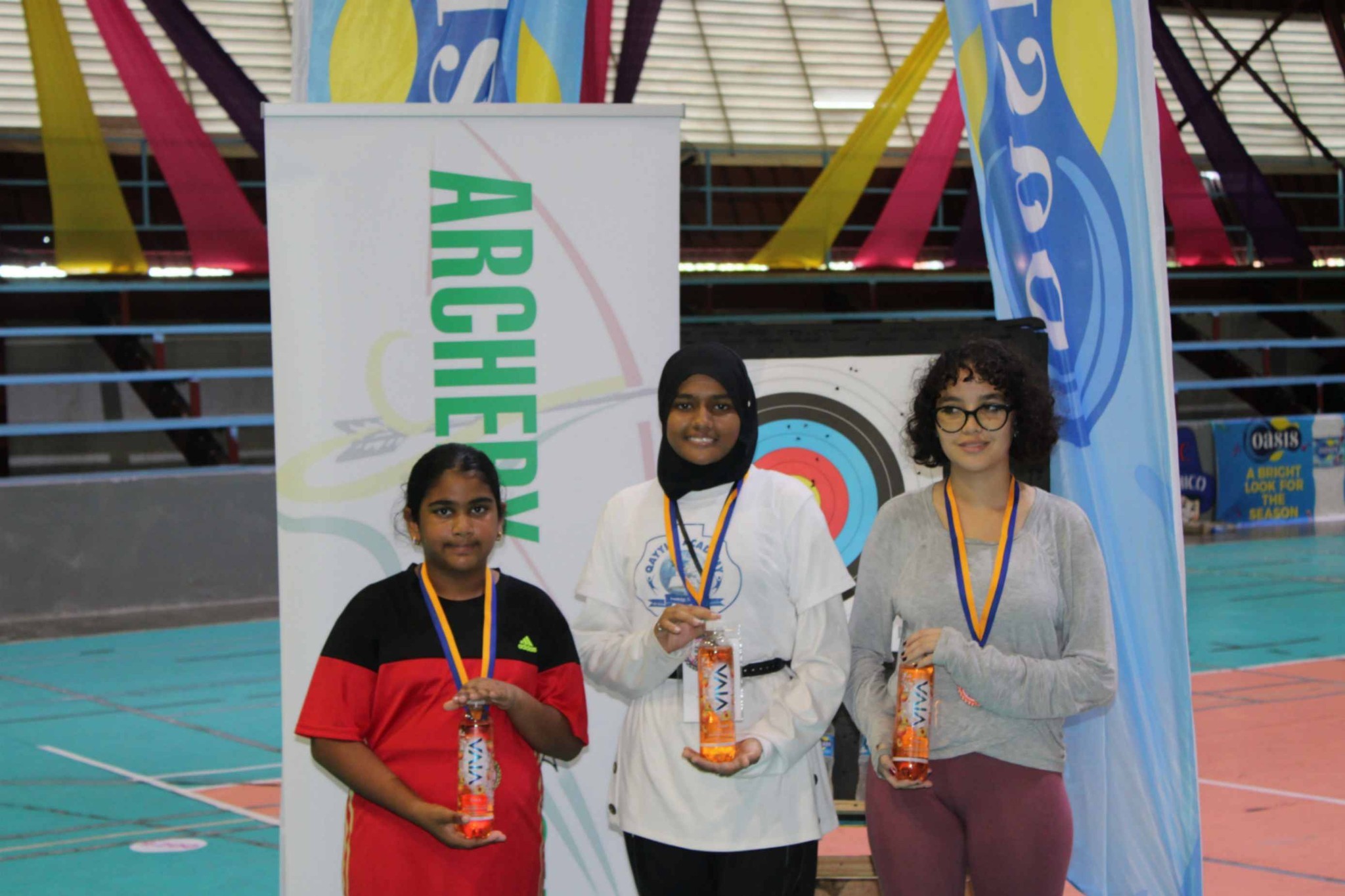 Female medalists pose at the Archery Guyana Inaugural Youth Championship