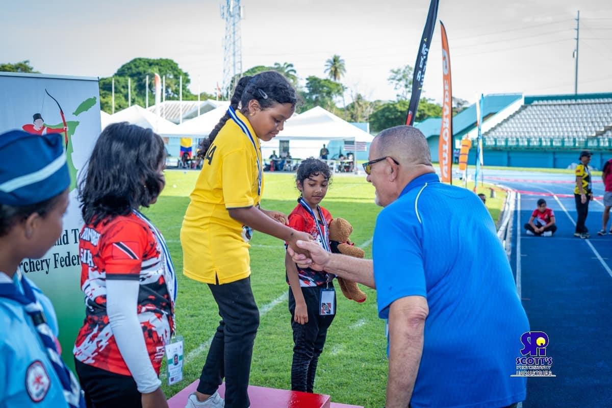 Archery contestants being scored at the Caribbean Development Championships 2023