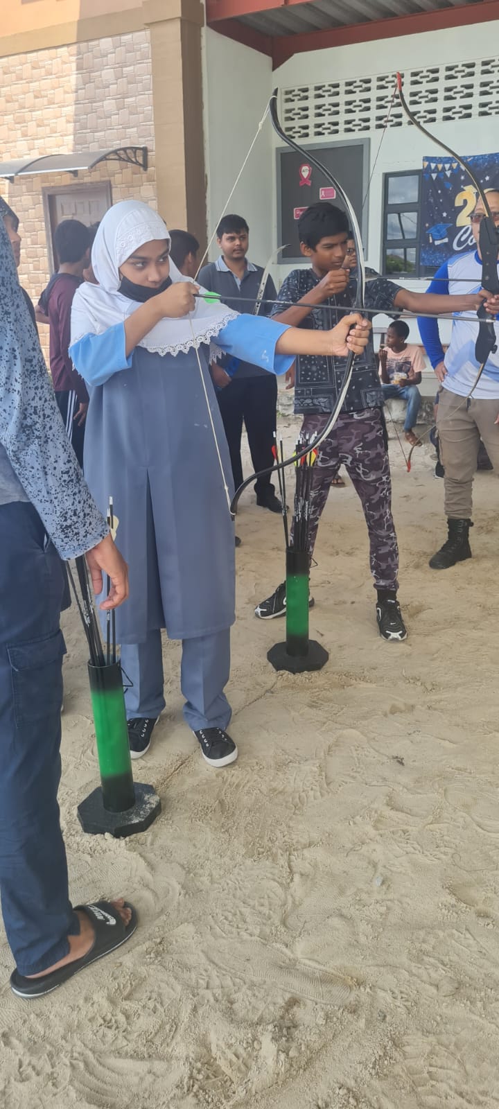 Female and Male archers of Qayyim Academy