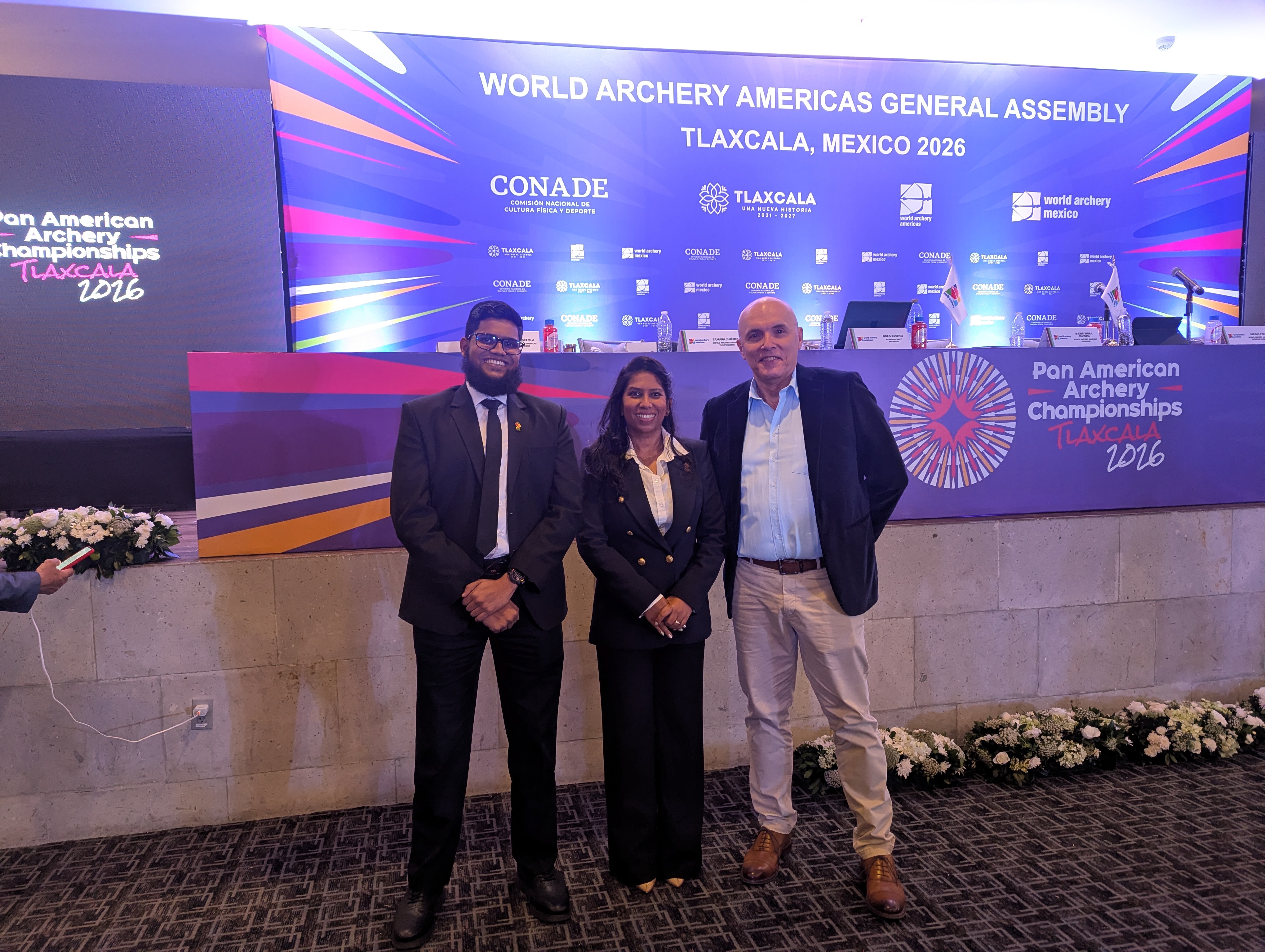 Mr Saeed Karim and Mrs Vidushi Persaud Mckinnon with WAA Secretary General Font
